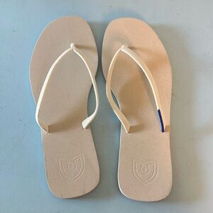 Rothys white flip flops size 8.
